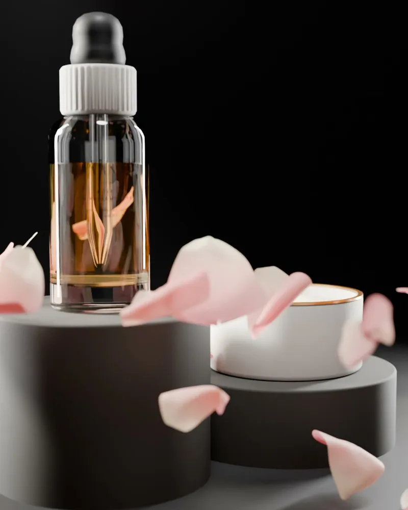 VARNIKA serum and night cream on dark plinths with rose petals